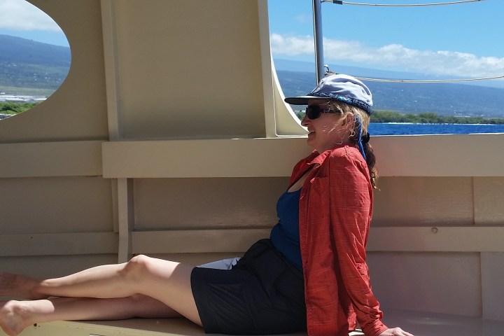 a person standing in front of a body of water