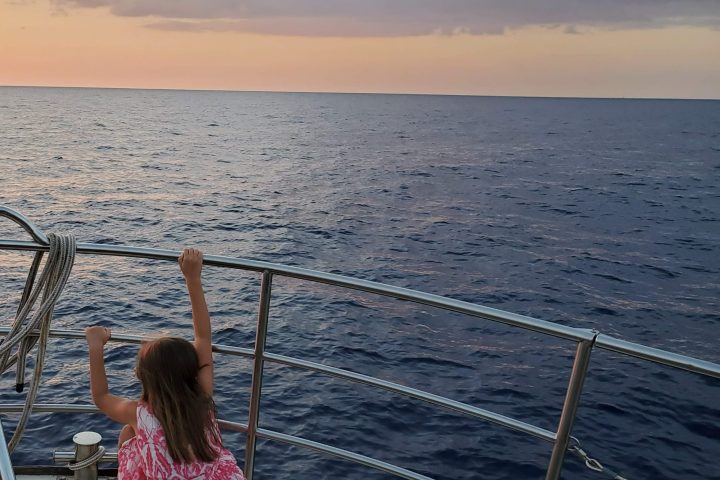 a person sitting at a beach